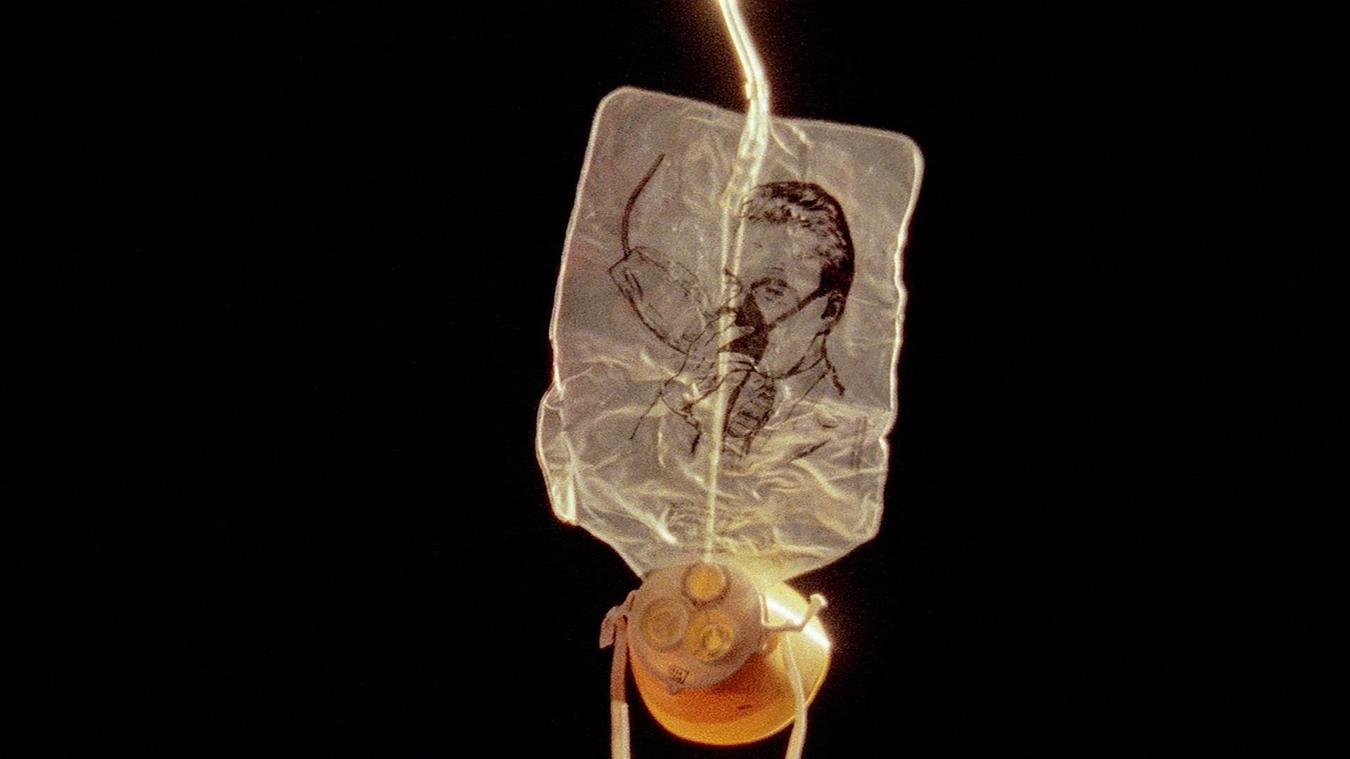 Video still from Hijacked showing a dangling oxygen mask.